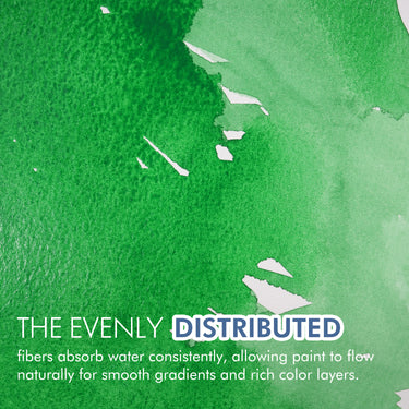Fuumuui 100% cotton cold-press watercolor paper with green paint demonstrating even absorption for smooth gradients.