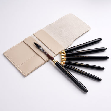 Fuumuui 6pcs High-Grade Pure Squirrel Hair Travel Watercolor Brushes with black handles and gold ferrules in a light beige case.