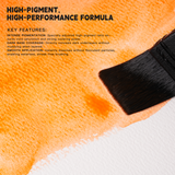 Fuumuui opaque semi-solid watercolor paint in vivid orange applied by a brush, showcasing its high-pigment, intense saturation, and smooth application for art supplies.