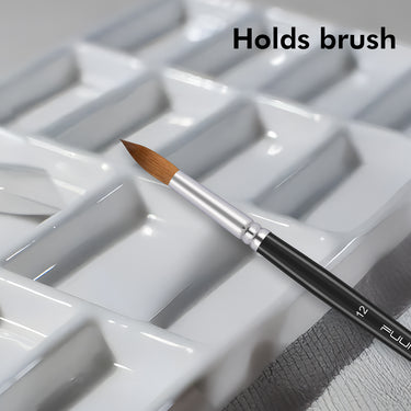 Palette de peinture en céramique pour artiste Fuumuui montrant un pinceau reposant dans son porte-pinceau intégré, idéal pour le mélange d'aquarelle et d'acrylique.