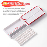 Palette d'aquarelle de voyage 28 godets Fuumuui, ouverte, montrant son couvercle rouge rotatif à 360° avec quatre plateaux de mélange, un emplacement interne pour pinceau de 105 mm et le godet amovible séparé de 28 godets ; fournitures d'art compactes Fuumuui.