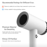 Souffleur d'art à double mode Fuumuui, un petit sèche-cheveux de voyage, doté d'une grille de sortie métallique durable et d'une finition brillante pour une utilisation domestique à l'air chaud ou à l'air froid pour le séchage des peintures.