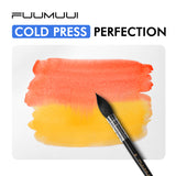 Fuumuui Cold Press watercolor block with perfectly applied orange and yellow paint swatches, featuring a Fuumuui art brush.