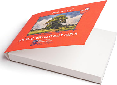 Fuumuui 100% Baumwolle Aquarellblock Journal 4x6 mit kalt gepresstem, strukturiertem Oberflächenpapier und rotem Einband mit einem Landschaftsgemälde.