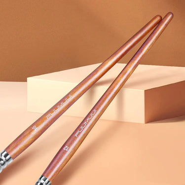 Fuumuui professional watercolor brushes, including sizes 16 and 12, from a 6-piece round and flat set with wooden handles.