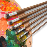 Fuumuui 6-piece badger hair dome round brush set on an artist's palette with vibrant paint colors.