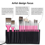 Ensemble de pinceaux de mélange acrylique professionnels Fuumuui & Samantha Anderson comprenant divers pinceaux plats, ronds, éventails et à texture conçus par des artistes avec des manches roses, ainsi que des couteaux à palette en métal, organisés dans un étui noir enroulable.