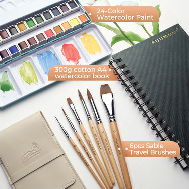 Fuumuui Art Supplies portable watercolor travel set with a 24-color paint palette, 300g cotton A4 watercolor pad, and a 6-piece sable travel brush kit in a storage case.