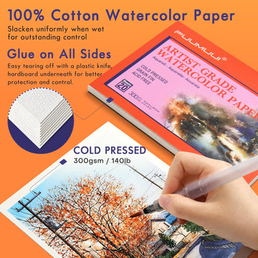 Fuumuui Artist Grade 100% Cotton Cold Pressed 300gsm Watercolor Paper pad, featuring glued edges, shown with a hand painting a detailed autumn landscape.