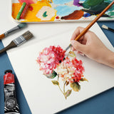 Fuumuui Art Supplies A4 20-sheet acrylic and oil painting pad in use, with an artist painting vibrant pink flowers, ideal for students, beginners, and professional painters.