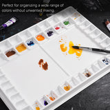 Palette d'aquarelle professionnelle Fuumuui à 47 godets, organisateur de fournitures d'art en plastique antiadhésif blanc rempli de peintures vibrantes, avec une zone de mélange centrale et un porte-pinceau.