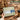 Holding Fuumuui A5 landscape 100% cotton watercolor sketchbook for outdoor travel sketching.