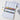 Flat lay of the FUUMUUI 36-color half-pan solid watercolor paint set in an open white metal tin.
