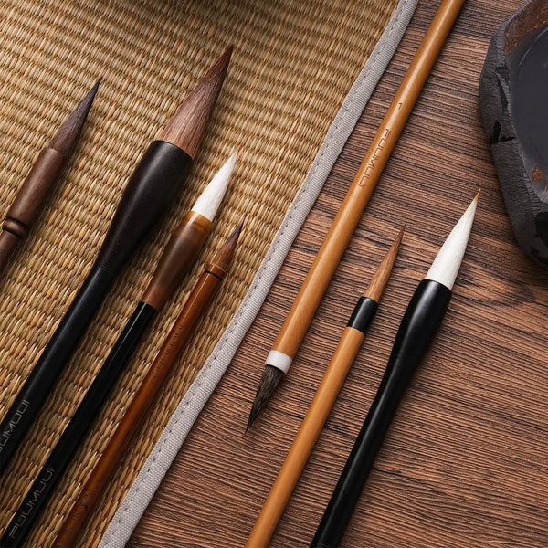 Fuumuui Chinese Calligraphy Brush set with natural bristle and goat hair tips. Professional artist bamboo handle brushes for watercolor and ink painting, including size 7 and fine detail brushes for beginners.