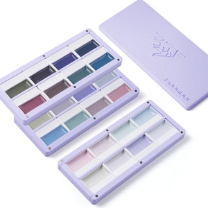 The FUUMUUI 3-Layer Light Purple Magnetic Palette, stacked and open, showcasing its muted paint colors.