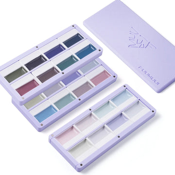 The FUUMUUI 3-Layer Light Purple Magnetic Palette, stacked and open, showcasing its muted paint colors.