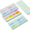 The FUUMUUI 3-Layer Magnetic Palette with Dreamy Macaron Paints, displaying its pastel color pans in multiple layers.