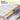 Close-up of a wet brush activating high-pigment pans in a solid watercolor paint set.