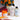 Fuumuui 120ml acrylic anti-mildew agent bottle placed among oil painting mediums and orange paint.