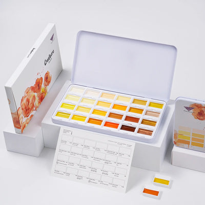 Complete Sunlit Yellow Creamora watercolor set displayed with original packaging box and swatch sheet.