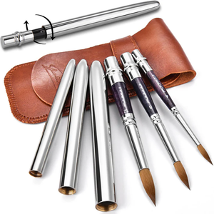A full set of three portable round watercolor brushes in different sizes, shown capped for travel.