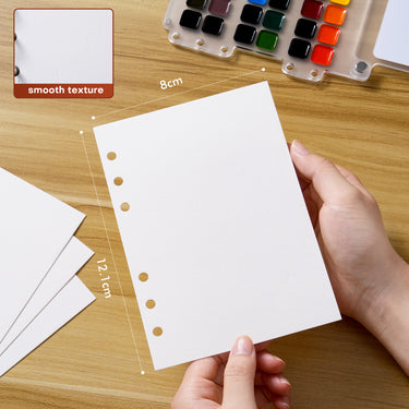 A sheet of 8 x 12.1 cm smooth hot-pressed cotton watercolor paper showing dimensions. 