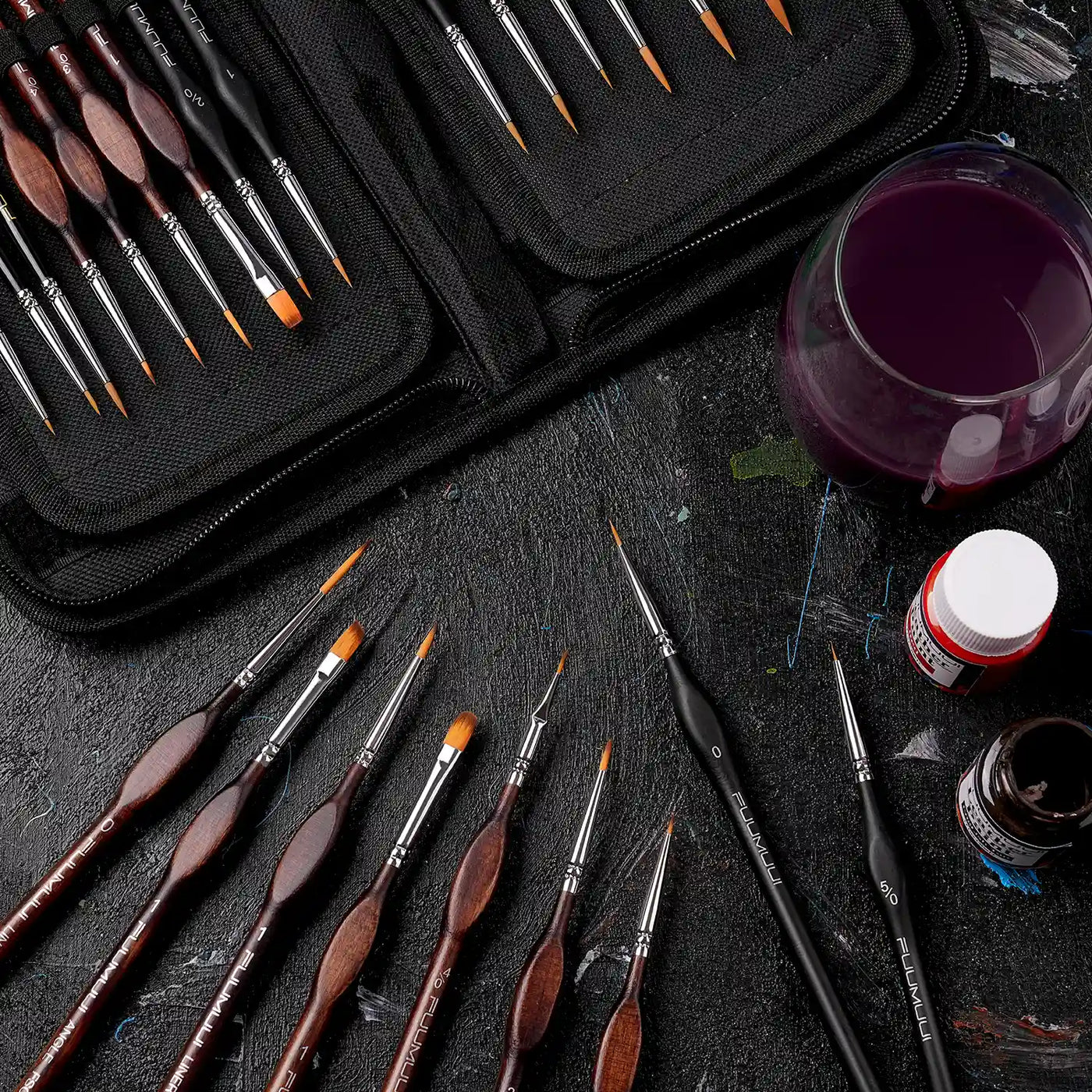 Fuumuui Miniature Paint Brush set with Synthetic Nylon bristles. Professional detail brushes in sizes 5/0, 0, 4/0, and 1, including Angle and Liner tips, ergonomic handles, and a black zippered travel storage case.