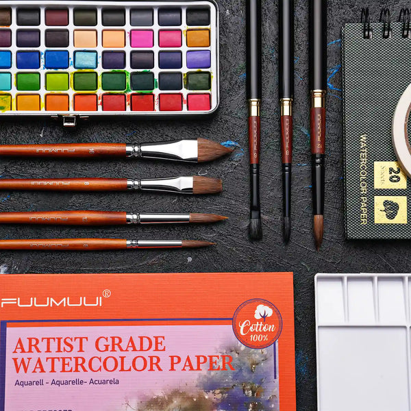 Fuumuui artist grade 100% cotton watercolor paper, watercolor paint set, professional Kolinsky sable brushes in round and dagger shapes, spiral watercolor sketchbook, and plastic palette for professional artists.