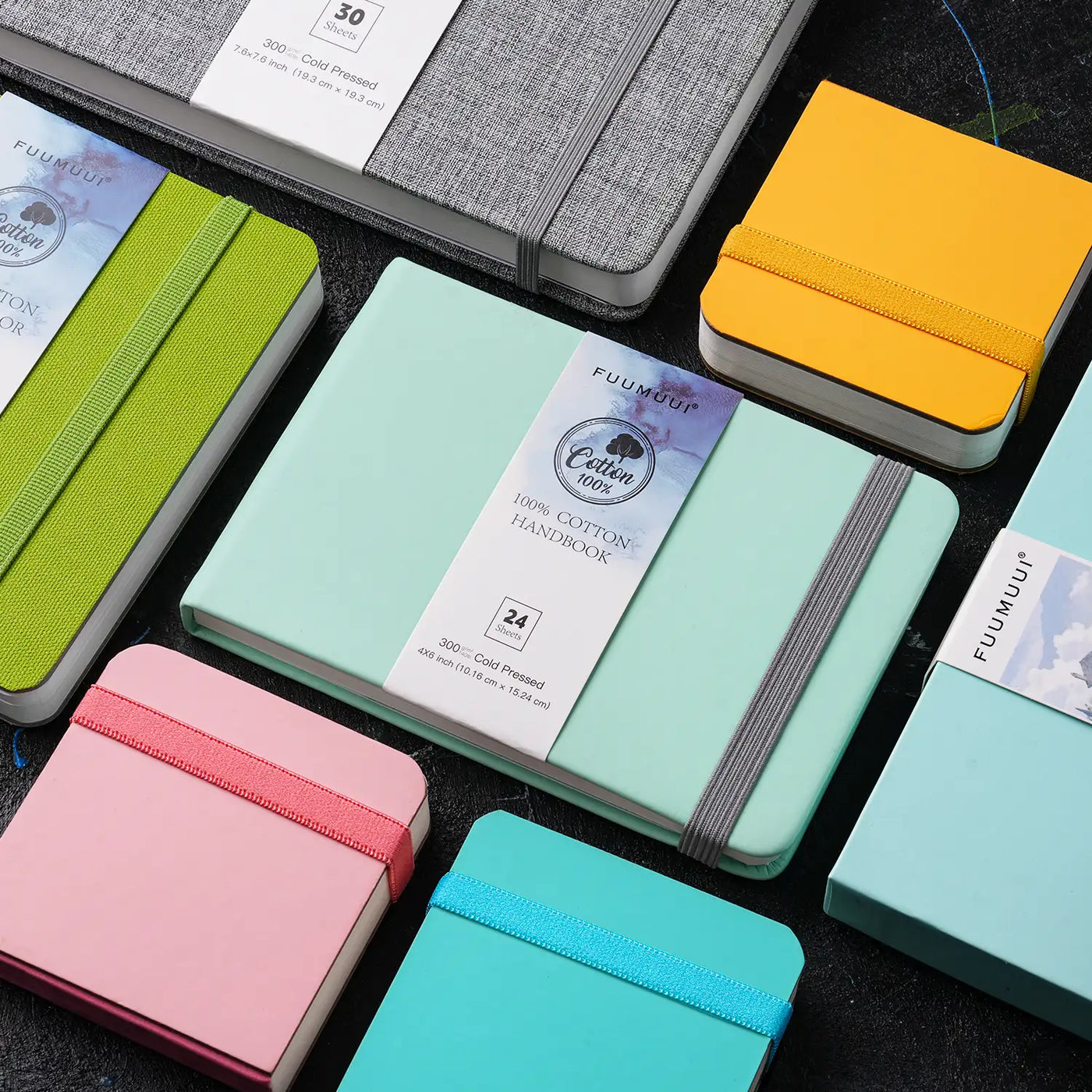 Fuumuui 100% Cotton Watercolor Sketchbook collection. Travel-sized 140lb/300gsm Cold Pressed handbooks in 4x6 inch and 7.6x7.6 inch sizes with elastic bands, perfect for professional artists and beginners.
